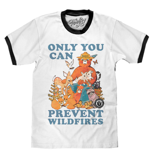 Watercolor graphic of Smokey Bear surrounded by forest animals and the 'Only You Can Prevent Wildfires' text printed on a white ringer tee with black collar and sleeve ribbing.