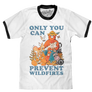 Watercolor graphic of Smokey Bear surrounded by forest animals and the 'Only You Can Prevent Wildfires' text printed on a white ringer tee with black collar and sleeve ribbing.