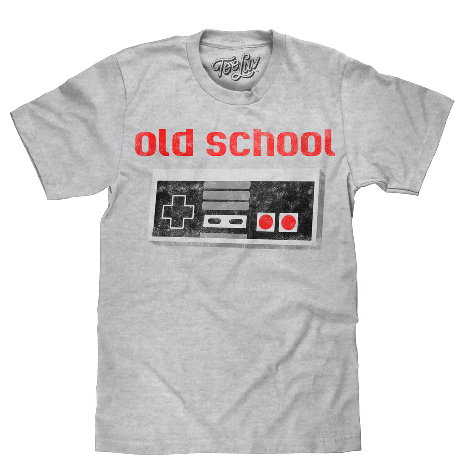 Novelty video game t-shirt featuring a retro 1980s gamepad controller and Old School text distressed and printed on a soft grey heather men's shirt.