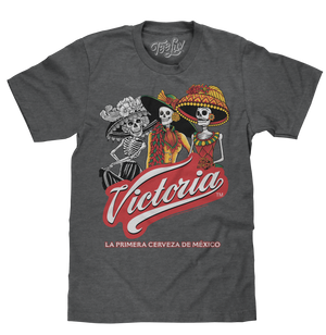 Mexican Victoria beer logo and colorful La Catrina graphic printed on a soft, charcoal grey heather men's tee shirt.