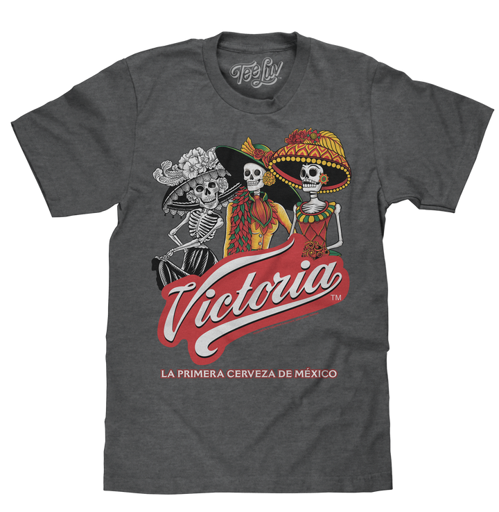 Mexican Victoria beer logo and colorful La Catrina graphic printed on a soft, charcoal grey heather men's tee shirt.